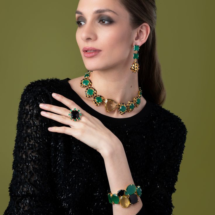 Presenting the Shai Earrings, meticulously crafted from semi-precious stones. These earrings offer versatile wear with four interchangeable styles, showcasing a timeless vintage design. Luxury Formal Earrings With Gemstone Accents, Elegant Green Gemstones For Formal Occasions, Luxury Gemstone Clip-on Earrings For Formal Occasions, Luxury Gemstone Clip-on Earrings For Formal Events, Luxury Emerald Jewelry For Formal Occasions, Timeless Evening Earrings With 17 Jewels, Yellow Gold Jewelry With Gemstone Accents For Evening, Evening Yellow Gold Jewelry With Gemstone Accents, Elegant Gemstones With Accents For Formal Occasions