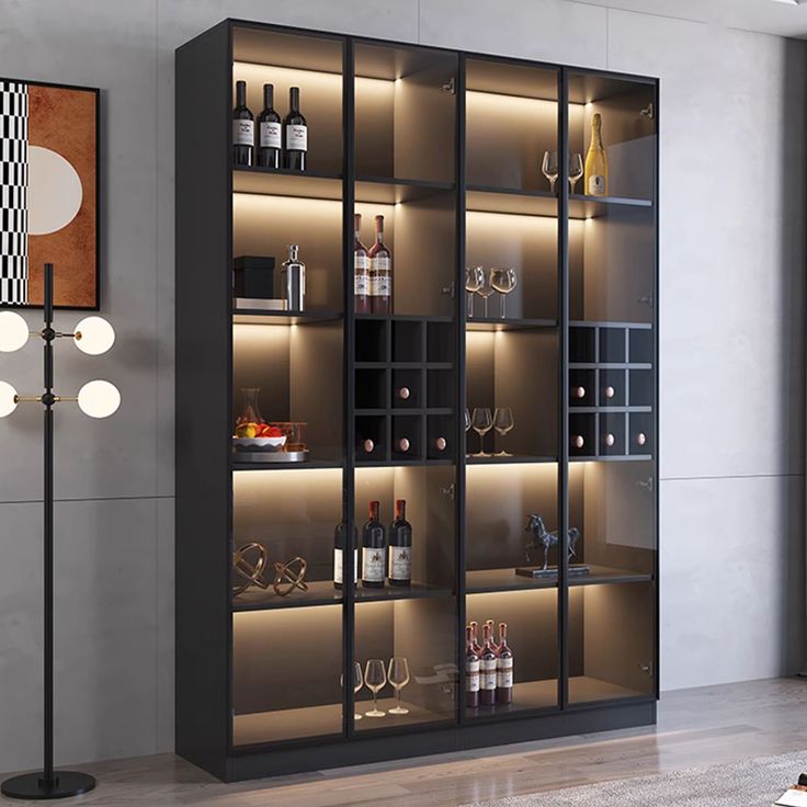 a glass door cabinet with wine bottles and glasses on it