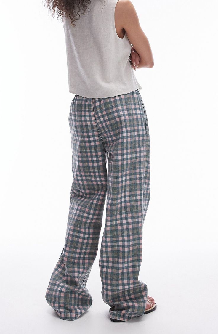 Neat checks lend depth to these straight-leg pants crafted from pure cotton twill and topped with a comfy elastic waist. Elastic waist Side-seam pockets 100% cotton Machine wash, line dry Made in Turkey Relaxed Fit Plaid Pants With Elastic Waistband, Casual Plaid Bottoms With Welt Pockets, Plaid Relaxed Fit Pants, Plaid Relaxed Fit Trousers, Relaxed Fit Plaid Trousers, Casual Plaid Pants With Welt Pockets, Cotton Bottoms With Welt Pockets For Loungewear, Casual Plaid Cotton Pants, Casual Cotton Plaid Pants