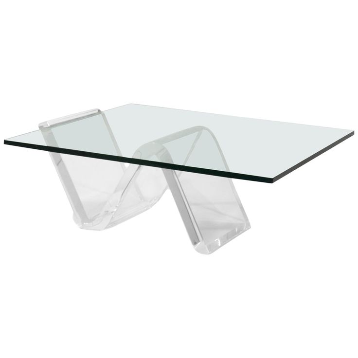 a glass and metal table with two legs on each side, in the shape of an x