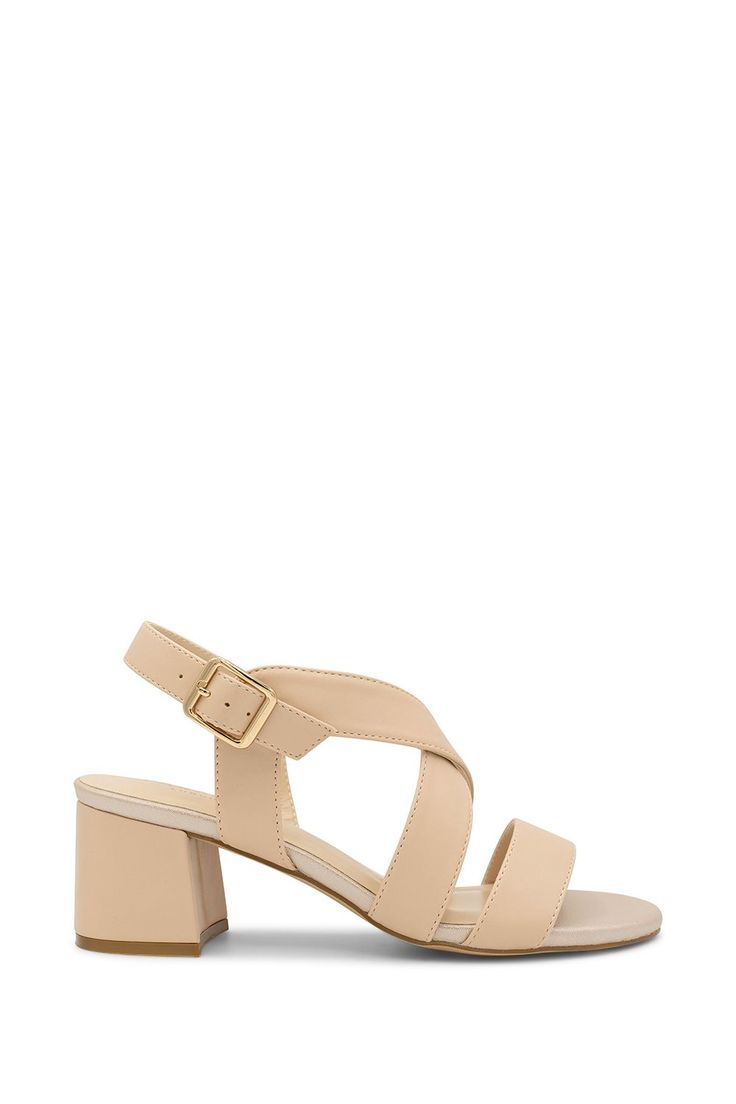 Paradox London Idelle sandals feature a low block heel and wide straps for added comfort and security. This sandal is the perfect addition to your holiday and party wardrobe. Chic Block Heel Wedge Sandals, Beige Open Toe Slingback Sandals With Padded Heel, Chic Sandals With Adjustable Strap, Elegant Leather Sandals For Summer, Chic Beige Slingback Sandals With Adjustable Strap, Beige Synthetic Sandals With Low Heel, Chic Sandals With Adjustable Strap For Evening, Beige Low Heel Synthetic Sandals, Chic Evening Sandals With Adjustable Strap