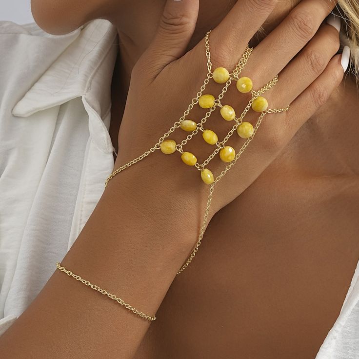 Material: Natural Stone Color: Yellow Fashion Element: Chain Style: Europe and America Finger Ring Bracelet, Back Chain, Wrist Accessories, Natural Stone Bracelets, Simple Fashion, Yellow Fashion, Finger Ring, Accessories Bracelets, Stone Bracelet