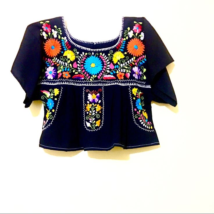 Mexican Blouse Note: Black Crop Top Embroidered Slouchy Boxy Bohemian Mexico Traditional Blue Embroidery Rare Ooak Piece Size: S/ M M/L Xl Traditional Black Blouse With Floral Embroidery, Black Summer Tops With Intricate Embroidery, Black Summer Blouse With Geometric Embroidery, Black Tops With Intricate Embroidery For Summer, Black Cotton Tops With Intricate Embroidery, Black Embroidered Tops For Summer, Black Blouse With Geometric Embroidery For Summer, Black Embroidered Top With Geometric Patterns For Festivals, Black Cotton Blouse With Geometric Embroidery