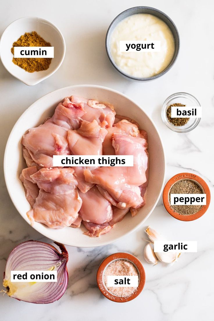 the ingredients for chicken thighs are shown in bowls