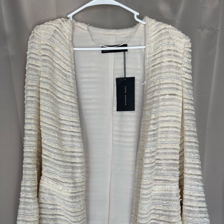 Zara Woman Nwt Textured Open Front Blazer Cardigan Size Medium Beige Cardigan For Workwear In Spring, Elegant Off White Outerwear For Spring, Zara Outerwear For Fall Brunch, Zara Long Sleeve Outerwear For Brunch, White Open Front Outerwear For Work, Elegant Cream Open Front Outerwear, Beige Cardigan For Spring Workwear, Chic Cream Cardigan For Layering, Cream Open Front Outerwear For Work