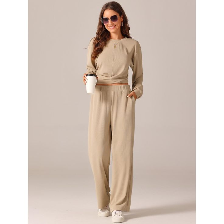 Fashion Style: Long Sleeve Crop Tops/Round Neck/Solid Color/Ribbed Knit/Wide Leg Pant/Tracksuit Lounge Sets. Perfect for both day and evening occasions, these blouses add a touch of elegance and style to any wardrobe. The twist front long sleeve top looks stylish and can be worn separately from the wide leg sweatpants. This lounge tracksuit is ideal for casual street looks, leisure at home, workouts, running, weekends, vacations, and beach outings. Made of 95% Polyester and 5% Spandex, it offers Two Pieces Outfits, Workouts Running, Pieces Outfits, Peplum Blazer, Wide Leg Sweatpants, Skirt Suit Set, Street Look, Cropped Sweatshirt, Business Suit