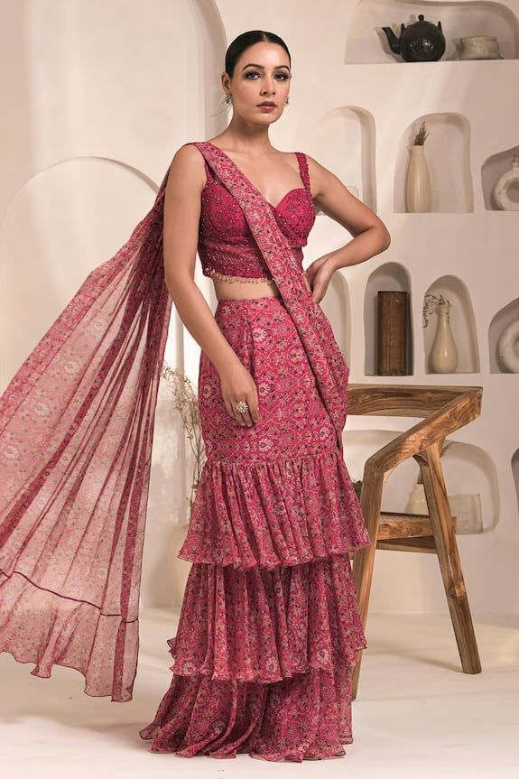 Pink pre-draped three layered saree with all-over floral prints. Comes with floral embellished padded corset blouse. - Aza Fashions Fitted Traditional Drape Sets For Reception, Designer Wear Fitted Georgette Pre-draped Saree, Fitted Pre-draped Saree With Sheer Dupatta For Navratri, Fitted Georgette Sharara With Traditional Drape, Designer Georgette Pre-draped Saree, Designer Pre-draped Fitted Georgette Saree, Fitted Bollywood Draped Sets, Fitted Draped Bollywood Sets, Fitted Palazzo Set With Traditional Drape For Reception