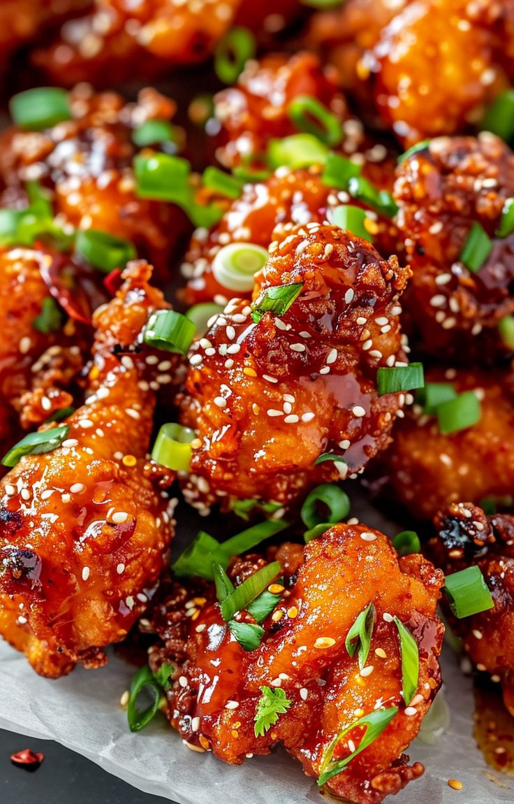 chicken wings with sesame seeds and green onions