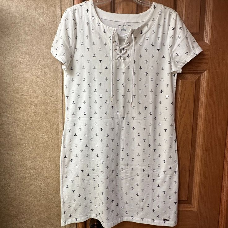 Turns Out I Didn't Want To Wear A Dress While On Vacation. So...: Nwt Tommy Hilfiger White W/ Navy And Gray Anchors T-Shirt Dress Lace Up Neckline - Like Lines On A Boat; How Clever Are Those Hilfigers?! Short Sleeves Knee Length 95% Cotton; 5% Elastane Size Medium (Shoulda Ironed. It Looks Terrible . My Bad. Note The Camper Bathroom As The Background. I No-Havey Iron W/ Me...) Hopefully You'll Want To Wear A Dress. Let Me Know. Crew Neck Cotton Beach Dress, Tommy Hilfiger Summer Beach Dress, Cotton Crew Neck Beach Dress, Nautical Style Short Sleeve Summer Dress, Nautical Short Sleeve Summer Dresses, Short Sleeve Nautical Summer Dresses, White Crew Neck Loungewear Dress, Summer Nautical Dress With Short Sleeves, White Cotton Tommy Hilfiger Dress