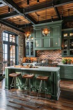 an open kitchen with green cabinets and wooden floors, along with bar stools that match the hardwood flooring