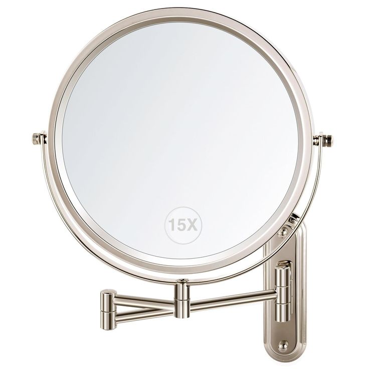 a round mirror mounted to the side of a metal stand with two handles on it