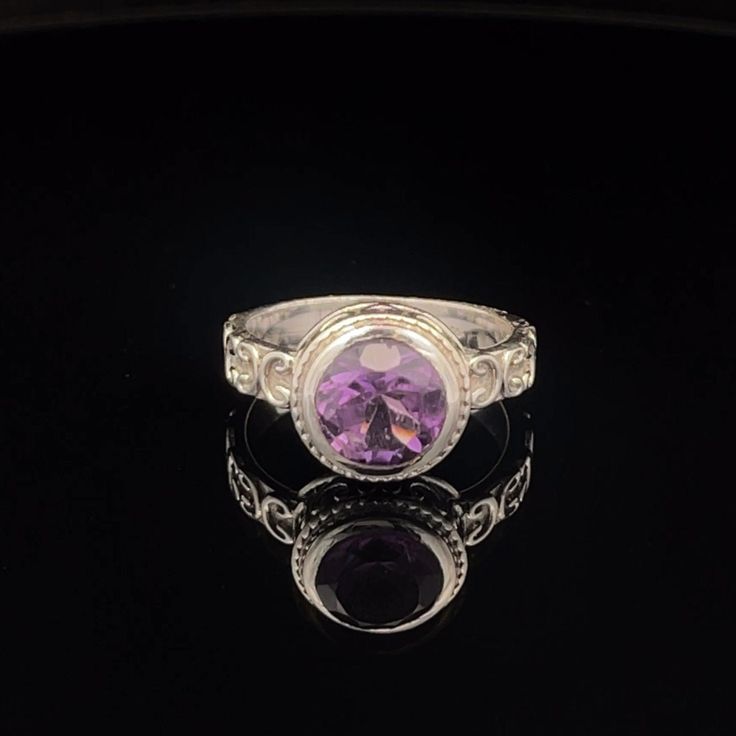 * Sterling Silver ring with Amethyst * The face of this ring measures 11mm X 11mm * This ring is size 7. * You will receive the exact ring pictured. Classic Round Purple Crystal Ring, Classic Purple Crystal Round Ring, Classic Purple Crystal Ring, Classic Purple Round Crystal Ring, Adjustable Amethyst Ring With Accent Stones, Classic Purple Round Rings, Amethyst Gemstone Signet Ring, Purple Solitaire Round Ring, Sterling Silver Signet Ring With Bezel Setting