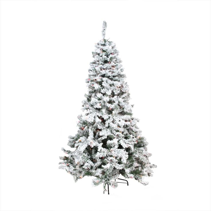 a white christmas tree with snow on it