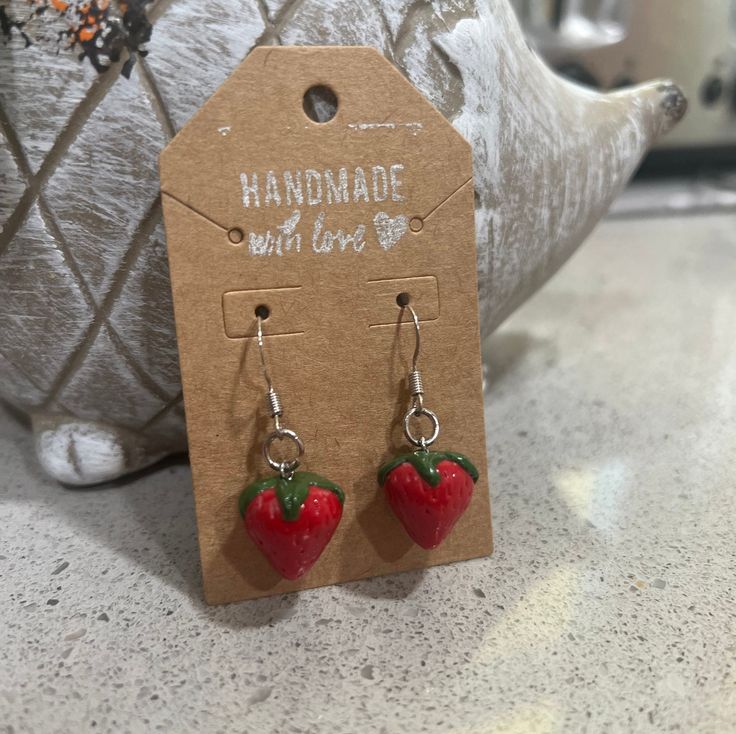 These adorable 3D strawberry earrings/necklace is great for any occasion! Red Dangle Jewelry With Fruit Design, Red Fruit Design Dangle Jewelry, Everyday Nickel-free Resin Jewelry, Handmade Red Sweet Earrings, Cute Berry Colored Jewelry With Fruit Design, Cute Berry-colored Jewelry With Fruit Design, Red Fruit Design Drop Earrings, Sweet Handmade Silver Jewelry, Sweet Silver Handmade Jewelry