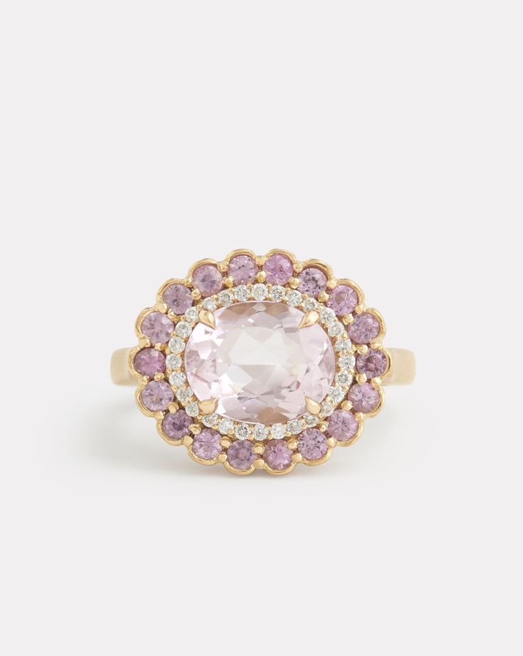 18K Yellow Gold Pink Tourmaline and Diamond Edged Morganite Oval Ring, .14 TCWOrnament is 3/4 Inch x 1/2 Inch Style# YRSSOPMW Elegant Multi-stone Pink Sapphire Diamond Ring, Elegant Pink Sapphire Ring With Rose Cut Diamonds, Elegant Round Pink Sapphire Gemstones, Elegant Multi-stone Diamond Ring With Pink Sapphire, Elegant Pink Sapphire Rose Cut Diamond Rings, Elegant Rings With Rose Cut Pink Sapphire, Oval Yellow Gold Gemstones With Halo Setting, Elegant Pink Sapphire Cluster Ring, Formal Gold Sapphire Ring With Pink Sapphire