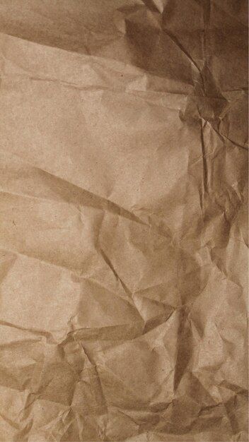 a piece of brown paper that has been wrinkled