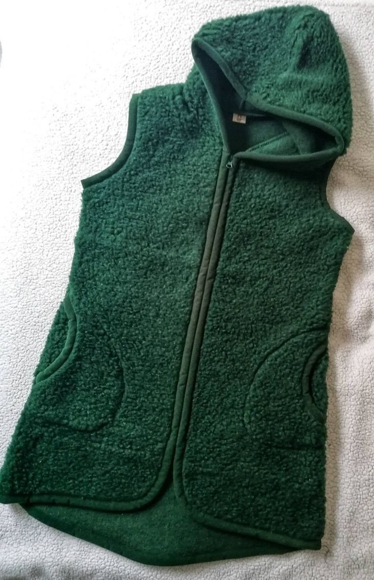 Stylish, high-quality, carefully made woolen vest. Perfect for every day and season. Thanks to the properties of wool, the body maintains a constant temperature, which translates into thermal comfort in everyday use. Longer at the back.  Material: 100% merino wool Year-round use.  Sheep fleece products are intended for everyday use and can be used as a means of therapeutic rehabilitation for people suffering from rheumatoid and degenerative diseases of joints, limbs, spine, inflammation of muscles, tendons and ligaments, and disturbances in the functioning of all systems of the human body. They significantly alleviate pain, rheumatic, arthritic, migraine, neuralgia and post-traumatic ailments.  Thanks to their sensational properties, they ensure a peaceful and healthy sleep, are well toler Fitted Winter Vest For Outdoor, Winter Sweater Vest For Cold Weather, Winter Sleeveless Sweater Vest For Cold Weather, Sleeveless Sweater Vest For Winter, Sleeveless Vest With Fleece Lining For Winter, Winter Sleeveless Vest With Fleece Lining, Fitted Solid Vest For Winter, Fall Fleece-lined Sleeveless Vest, Sleeveless Fleece-lined Vest For Fall