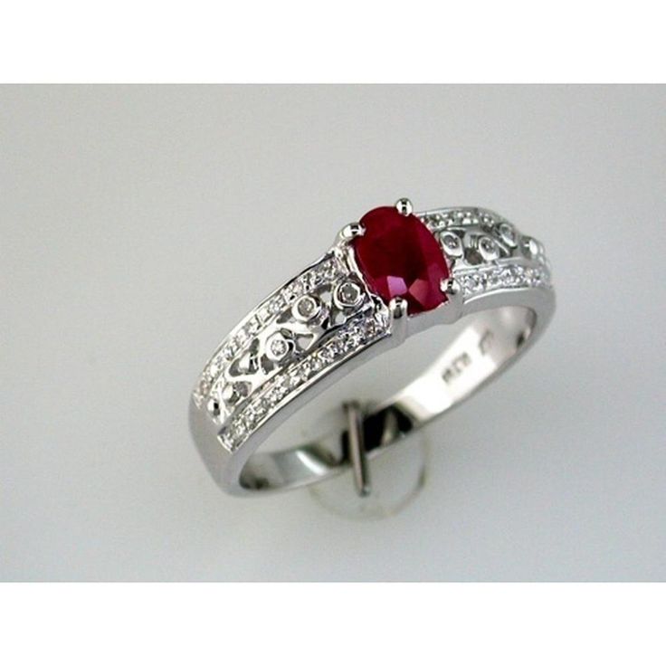 Royal 14K White Gold Ruby & Diamond Ring - 0.60 Carat Oval Ruby - 0.14 Carat Total Diamond Weight Oval Ruby Jewelry With Brilliant Cut For Weddings, Exquisite Oval Ruby Ring, Exquisite Oval Ruby Ring With Center Stone, Formal Oval Lab-created Ruby Ring, Exquisite Oval Ruby Ring In White Gold, Oval Lab-created Ruby Fine Jewelry For Wedding, Classic Oval Ruby Ring With Diamond Cut, Oval Lab-created Ruby Ring For Anniversary, Oval Lab-created Ruby Wedding Jewelry