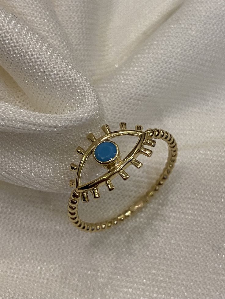 "ABOUT PRODUCT This 14K Gold Evil Eye Ring is beautifully designed and hand crafted with our associates to make this a special gift for your loved ones. Knowing the value of our customers, We prepare each piece with extra care and attention. ITEM DETAILS Material: 14K Gold Approx: 1.25 gram Available colors: Gold, Rose Gold, White Gold Available Sizes: 4 US to 11 US ✪ 14k Solid Gold ( Certification will be included with your order ) ✪Available 14K White, Yellow, Rose Gold (also in 10, 18K) 🛠 Ya Blue Stackable Midi Rings, Adjustable Blue 14k Gold Rings, Blue 14k Gold Stackable Rings As Gift, Evil Eye Ring Jewelry Gift, Handmade Symbolic Yellow Gold Rings, Symbolic Handmade Yellow Gold Rings, Spiritual Blue Ring With Evil Eye Detail, Blue Spiritual Ring With Evil Eye, Spiritual Blue Rings With Evil Eye Detail