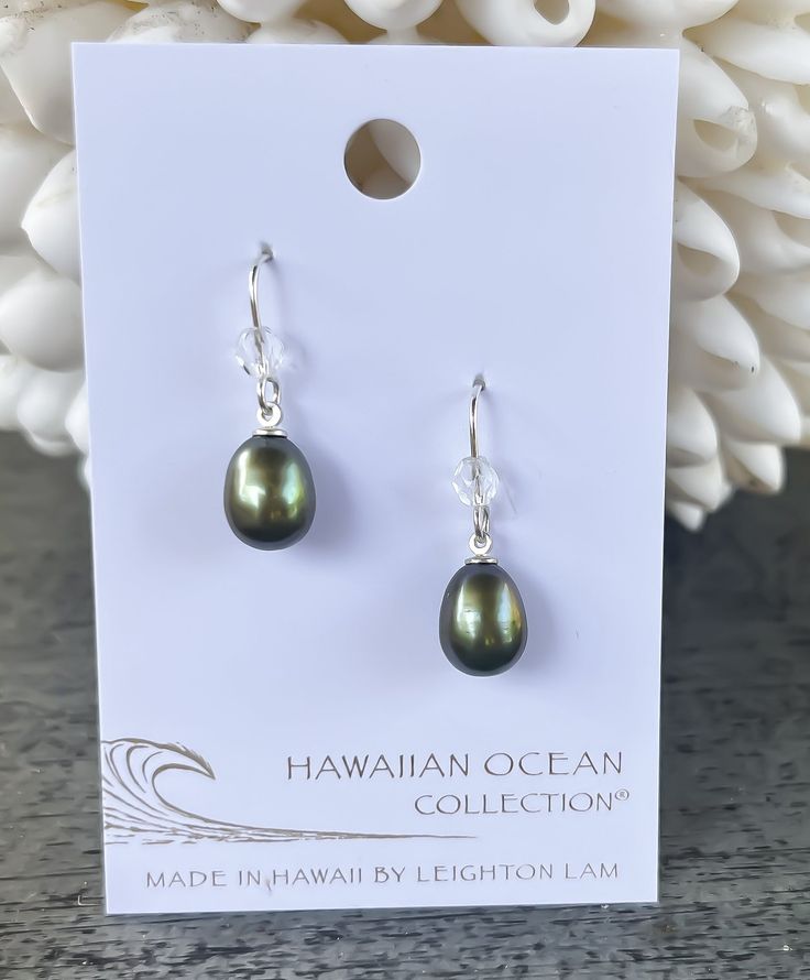 A classic freshwater pearl earring to accentuate your style. We match each pearl by hand, but just like you, each pearl is unique. Length: 0.6" Materials: 9mm Freshwater Pearl. Czech Fire Polish Bead. Sterling silver ear wires. Collection: Hawaiian Ocean Collection Classic Teardrop Nickel-free Pearl Earrings, Classic Tahitian Pearl Jewelry With Matching Earrings, Classic Tahitian Pearl Earrings For Gift, Classic Tahitian Pearl Earrings As Gift, Tahitian Pearl Drop Earrings Gift, Classic Pearl Earrings With French Hook, Oval Pearl Drop Earrings Gift, Classic Silver Pearl Earrings With French Hook, Classic Pearl Earrings With French Hook As Gift