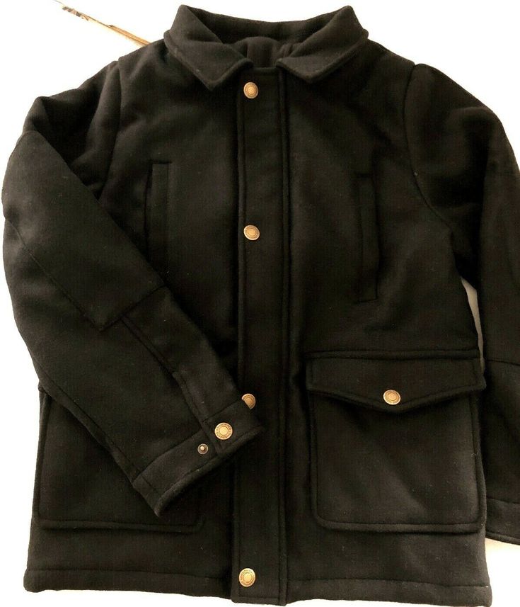 Boys London Fog Coat Black Hood Pockets Zipper Snaps Washable Med 10-12. Style: L217D44-BL Boy's London Fog solid black coat. Fabric looks like all wool, but is a wool blend and machine washable. Full front zipper and snaps for front closure. Each snap appears to be a button, but is covered with antique brass with London Fog embossed. Attached hood is soft fleece backed fabric. It is a thinner fabric than coat and gives you the option of placing it inside coat if you choose not to wear. Coat has Casual Black Wool Coat With Pockets, Hooded Wool Outerwear, Solid Wool Hooded Outerwear, Solid Color Wool Hooded Outerwear, Black Buttoned Outerwear For Outdoor, Black Wool Coat With Pockets For Winter, Black Wool Coat With Pockets For Cold Weather, Black Outdoor Outerwear With Buttons, Hooded Wool Pea Coat With Pockets