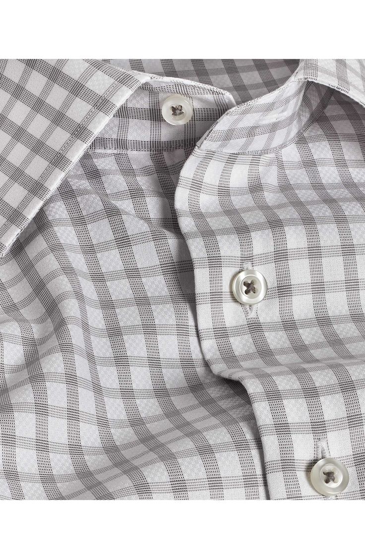 A classic check pattern smartens the look of this versatile dress shirt made from cool and comfortable cotton with adjustable button cuffs. 31 1/2" length Spread collar Rounded, adjustable button cuffs 100% cotton Machine wash, line dry Imported Plaid Spread Collar Shirt For Business Casual, Business Casual Plaid Shirt With Spread Collar, Classic Plaid Dress Shirt For Work, Classic Plaid Fitted Shirt, Classic Fitted Plaid Shirt, Plaid Fitted Classic Shirt, Classic Plaid Shirt With Spread Collar, Classic Plaid Shirt With Buttons, Formal Plaid Shirt With Button Closure