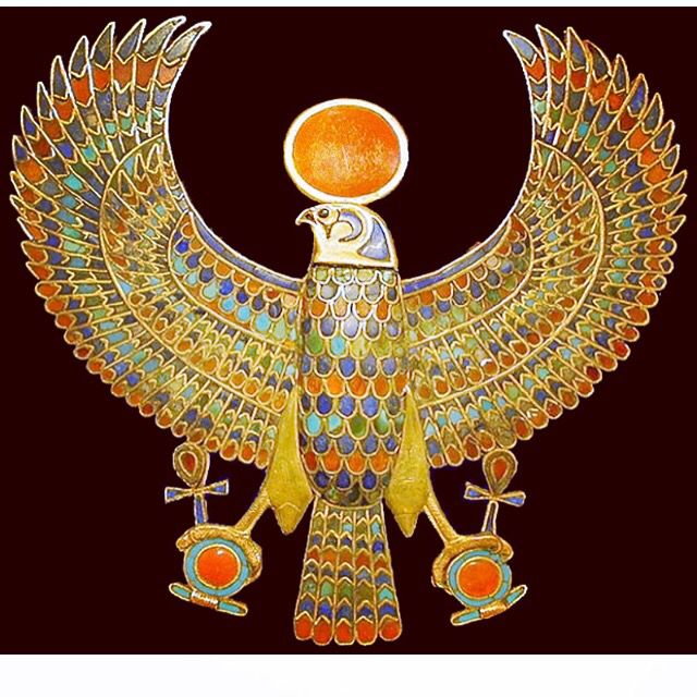 an egyptian bird with two heads on it's back