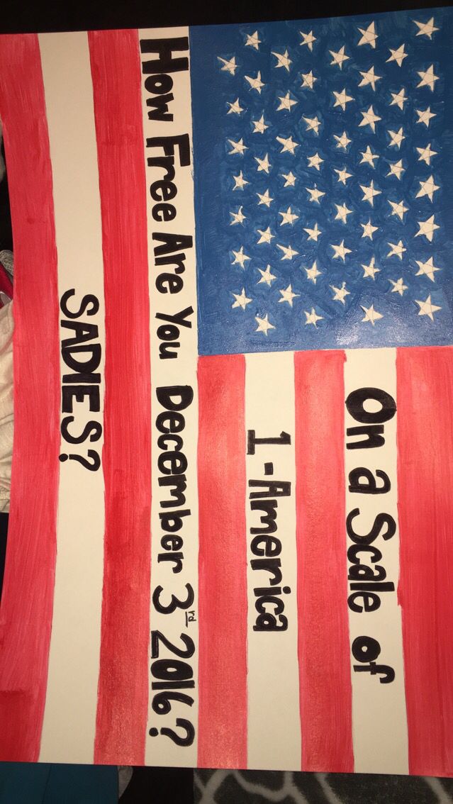 an american flag made out of paper with the words on it and two stars in red, white and blue