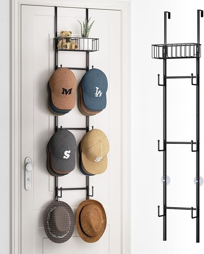 several hats are hanging on the wall next to a door with a hat rack in front of it