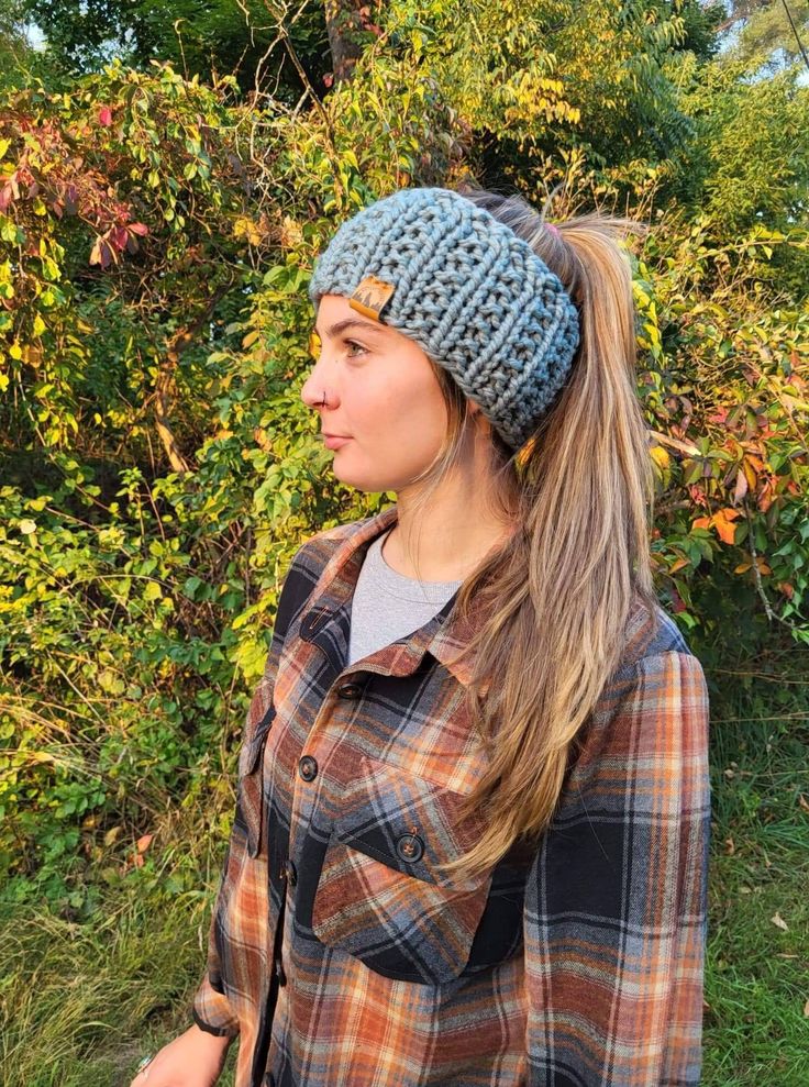 "Chunky knitted headband with unique ribbed texture that is cozy and warm. It is wider than the average headband for better ear and head coverage, and a more flattering style. It fits snug around the head at first and will loosen with wear to perfectly fit your head. Perfect accessory for fall and winter. Can be worn with hair up or down, and can also be worn as a cowl around the neck. Check out my shop for more knit winter accessories.  Sizing: One size fits 21\" to 23\" head size Fiber content Casual One Size Headband For Fall, Adjustable Casual Headband For Fall, Adjustable Casual Headband For Winter, Casual Winter Headband One Size, Winter Crochet Hat Headband, Casual Knitted Headband, Winter Crochet Headband, Casual Yarn Headband For Winter, Knitted Yarn Headband For Winter