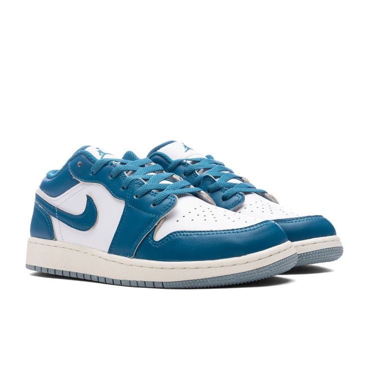 This Air Jordan 1 Low SE (GS) classic features a genuine leather upper paired with a lace-up front, a signature swoosh at the side, and embroidered Jumpman branding at the tongue and heel. Seen in ‘Industrial Blue’ with a white base, the sail rubber midsole has an aged look while the gray outsole ties the design together. DUE TO THE LIMITED NATURE OF THIS PRODUCT, ALL SALES ARE FINAL. THIS ITEM IS NOT ELIGIBLE FOR DISCOUNTS OR SPECIAL PROMOTIONS. Leather upper with rubber sole Lace-up front Cushioned tonguePadded low-cut collar Perforated toe Signature Swoosh at side Foam midsole All sizes are listed in U.S. Grade School sizing unless stated otherwise Style No: FN9137-141 Blue Leather Sneakers With Elastic Laces, Classic Blue Lace-up Sneakers, Classic Blue Sneakers With Laces, Blue Leather Jordan Shoes With Laces, Casual Blue Leather Jordan Shoes, Jordan Low, Industrial Blue, Black Legends, White Industrial