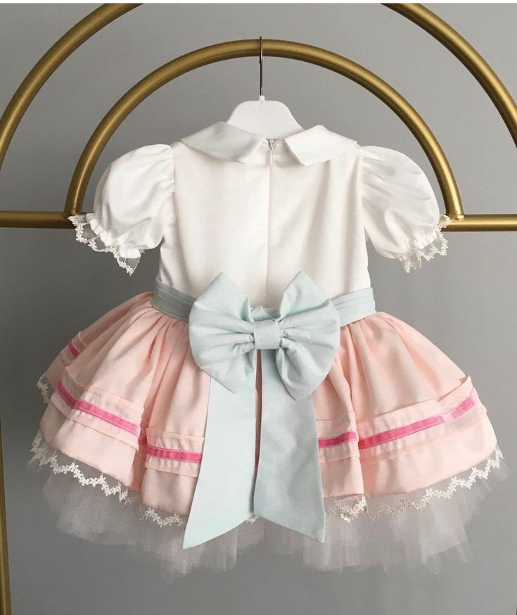 White Bow Dress For Birthday, Sweet White Princess Dress For Birthday, White Tutu Dress With Bow For Birthday, Fitted Tutu Dress With Bow For Baptism, White Fitted Dress For Birthday, Fitted White Dress For Birthday, Cute Tulle Princess Dress With Short Sleeves, Princess Baptism Dress With Bow, Princess Style Baptism Dress With Bow For Formal Occasions