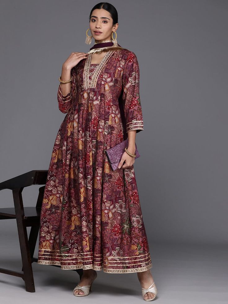 Grab this beautiful 2-piece set. The set comes with floral print & gota patti detailing anarkali kurta has v neck, 3/4th sleeves & calf length teamed with silk chiffon dupatta with lace detailing. Color - Mauve Kurta Fabric-Silk Dupatta Fabric - Silk Chiffon Neck-V Neck Sleeves-3/4th Sleeves Work - Floral Print & Gota Detailing Washing Instructions-Hand Wash DISCLAIMER - The color of the product may be differ due to screen settings of device. A misprint here and a color drop slip there is the beauty of printing which is not treated as a defect. Kurta With Dupatta, Formal Jewelry, Anarkali Kurta, Chiffon Dupatta, Silk Dupatta, Fabric Silk, Churidar, Fabric Shop, Formal Wedding