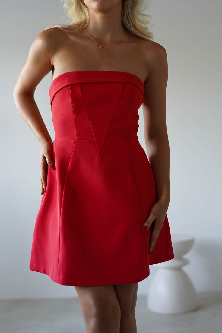 Highlights Gorgeous structured strapless mini Fully Lined Available in Red & Pink Sizing The model is 5'5 and wears UK size 8 / S / US size 4 Fit & Fabric Made from 100% Polyester Bust is lined with non slip latex Rear zip True to size Length from top of bust to hem: 61cm Stretch: 6/10 Perfect for Wedding Guest Graduations Parties Red Mini Dress With Straight Neckline, Red Strapless Corset Dress For Formal Occasions, Red Strapless Corset Dress For Spring, Red Mini Dress With Straight Neckline For Night Out, Red Strapless Bodycon Dress, Strapless Lined Mini Dress For Party, Fitted Red Mini Dress With Straight Neckline, Elegant Red Sleeveless Tube Top, Chic Red Corset Dress For Date Night