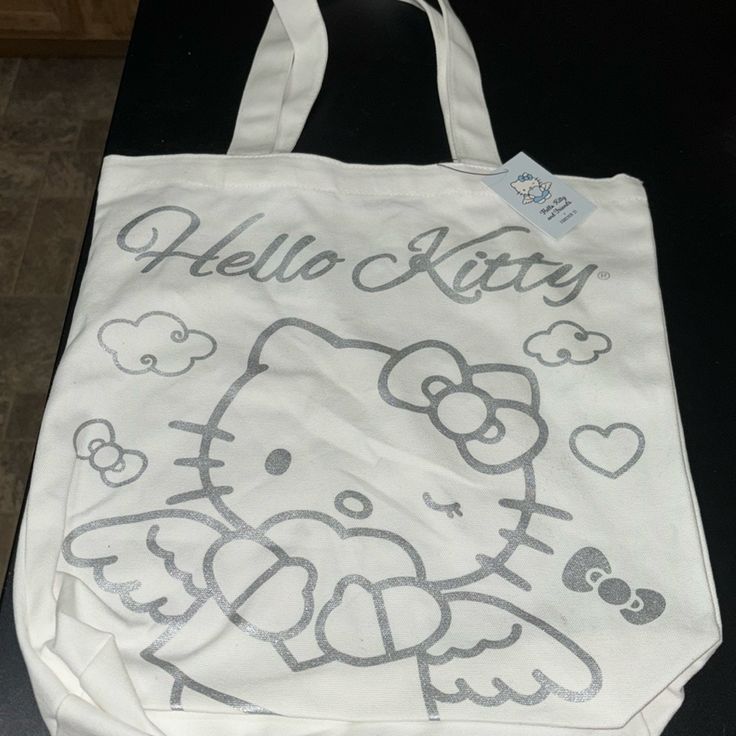 Forever21 Hello Kitty Canvas Tote Brand New With Tags Forever 21 Hello Kitty, Hello Kitty Canvas, Hello Kitty Tote Bag, Hello Kitty Tote, Forever 21 Bags, Plush Backpack, Phone Holster, Bag Ideas, Walker Boots