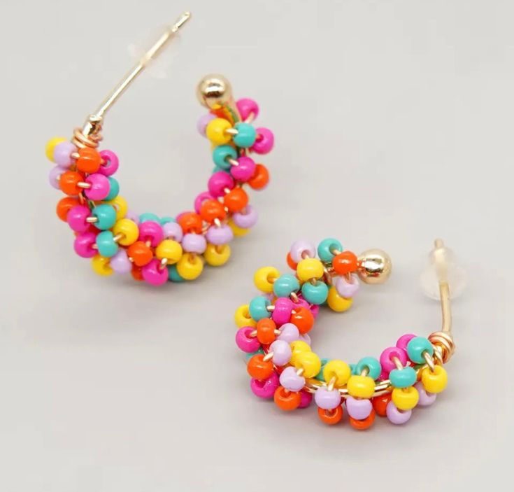 The perfect summer and vacation earring! These are bright and fun! Just about the size of a nickel. Dangle Hoop Earrings With Tiny Beads For Beach, Trendy Dangle Hoop Earrings For Spring, Trendy Multicolor Hoop Earrings With Ear Wire, Trendy Small Hoop Earrings With Colorful Beads, Summer Vacation Dangle Hoop Earrings, Trendy Spring Dangle Hoop Earrings, Trendy Colorful Hoop Jewelry, Spring Trendy Dangle Hoop Earrings, Beach Hoop Earrings With Dangling Beads