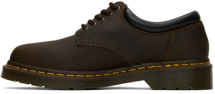 Oiled buffed leather oxfords in brown. Subtle distressing throughout. · Five-eye lace-up closure · Padded collar · Padded leather footbed · Buffed leather lining · Yellow topstitching at Goodyear welt · Treaded Air Cushion rubber sole Supplier color: Dark brown Vintage Low-top Oxfords For Workwear, Rugged Brown Oxfords With Round Toe, Vintage Brown Leather Oxfords With Leather Sole, Brown Lace-up Oxfords With Leather Lining, Vintage Brown Lace-up Shoes For Business, Vintage Oxfords With Leather Footbed For Work, Brown Lace-up Oxfords With Leather Footbed, Vintage Leather Oxfords For Work, Vintage Leather Oxford Shoes For Work