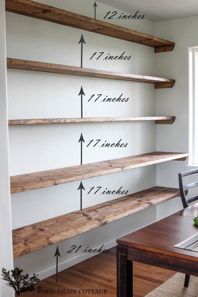 some shelves are labeled with numbers and measurements for the top shelf in this dining room