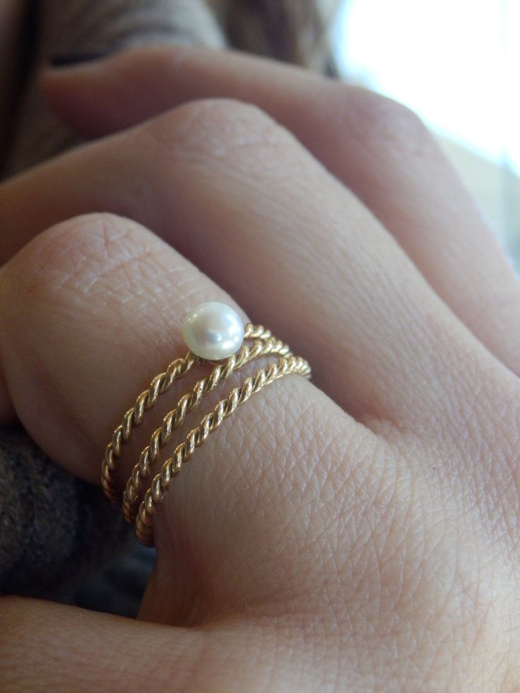 This elegant ring is a handmade ring from 14k solid gold . It is a modern and timeless ring that will never go out of style. You can wear it with other rings on one finger or as one of many rings on different fingers Also you can offer it as birthday gift ( as Pearl is June birthstone) as Bridesmaid Gift or wear it as Bridal Wedding Ring. If you don't know your ring size: you may stop at any jewelry store to have your ring size taken or visit one online ring size guide Please note that finger si Gold Medallion Necklace, Cotton Anniversary Gifts, Pearl Engagement Ring, Timeless Ring, Cotton Anniversary, 70th Birthday Gifts, Gold Medallion, Bridal Wedding Rings, Solid Gold Ring