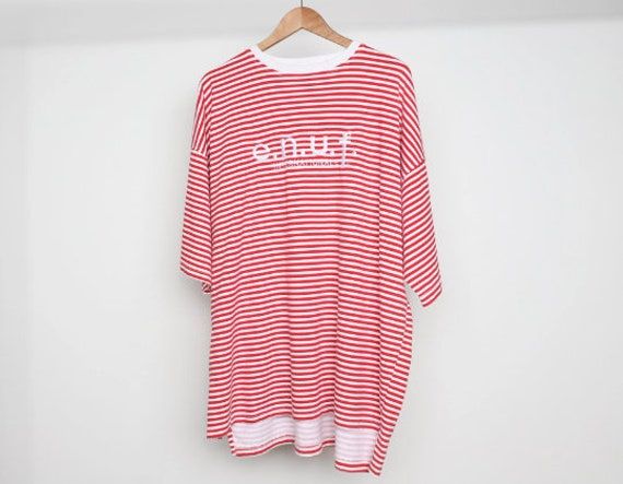 Made by ENUF Size XL listed Across chest - 27 inches Length - 30 inches Great condition! 50% cotton, 50% poly CAI17 Casual Summer T-shirt With Three Stripes, Sporty Striped T-shirt For Summer, Summer Streetwear T-shirt With Contrast Stripes, Contrast Stripes T-shirt For Summer Streetwear, White T-shirt With Contrast Stripes For Summer, Summer Crew Neck T-shirt With Three Stripes, White Vertical Stripes Top For Beach, White Contrast Stripes T-shirt For Summer, Striped Crew Neck Tops For Vacation