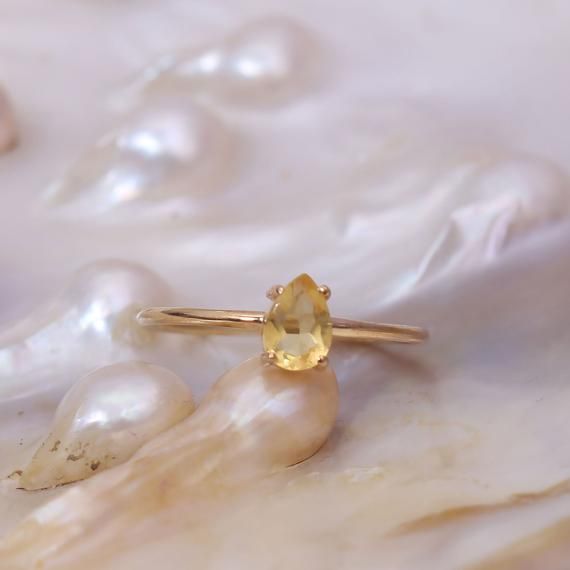 Hey, I found this really awesome Etsy listing at https://www.etsy.com/listing/927063705/pear-citrine-ring-14k-gold-citrine Briolette Gemstone Wedding Rings, Pear-shaped Yellow Gold Diamond Ring With Rose Cut, Anniversary Rings With Pear-shaped Rose Cut Diamonds, Pear-shaped Rose Cut Diamond Rings For Anniversary, Yellow Sapphire Ring With Prong Setting For Weddings, 14k Gold Yellow Rings With Rose Cut Diamonds, Yellow Gold Ring With Yellow Sapphire For Anniversary, Promise Yellow Gold Topaz Ring, Teardrop Yellow Gold Sapphire Ring