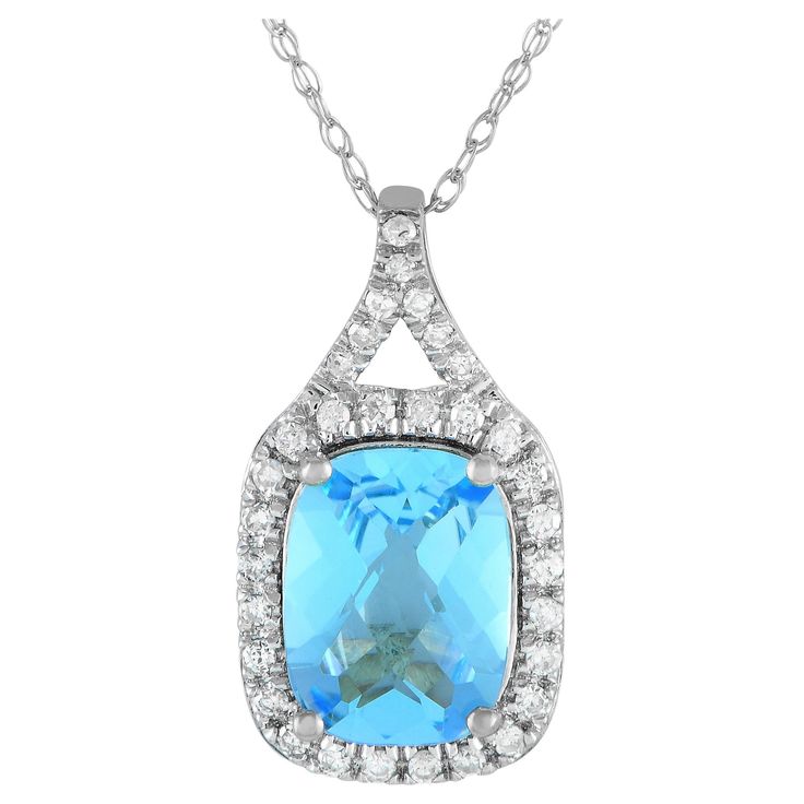 A brilliant blue Blue Topaz gemstone makes a statement on this impeccably crafted luxury necklace. This pieces pendant is crafted from 14K White Gold and measures 0.75 long by 0.45 wide. Its suspended from an 18 chain and includes sparkling Diamond accents with a total weight of 0.13 carats.This jewelry piece is offered in brand new condition and includes a gift box. Blue Topaz Gemstone, Luxury Necklace, Sparkling Diamond, Topaz Gemstone, Sparkle Diamonds, Blue Topaz, Jewelry Pieces, Topaz, Jewelry Necklace Pendant