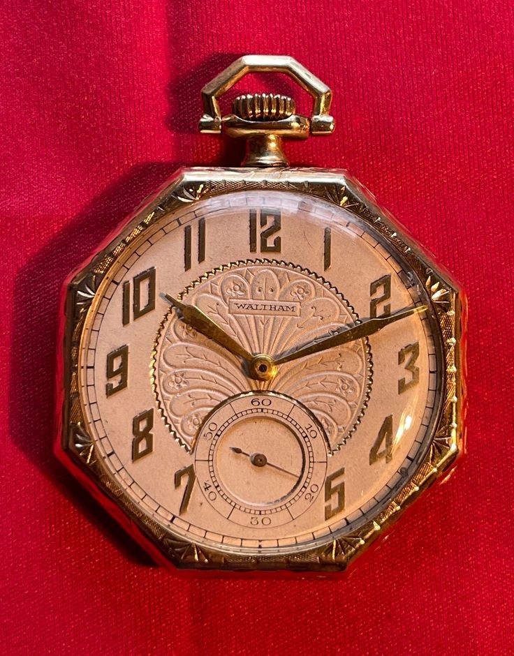 Watchmaker:Waltham Watch Co. Movement:Waltham - Model 1894 - Grade 225 - Mechanical - Hand Wound - Stem Set - 17 Jewels - Size 12 - American- Case Maker:National. Case Material:Solid 14k Gold Case Type:Octagonal - Open Face - Solid 14k  Gold - Dual Hinged w/ Swing-Out Movement Mounting Case Serial No.:706047 Case Diameter:43.0mm Weight:58 Grams (Case and Movement) Condition:Fine quality, antique, American-made pocket watch in excellent condition. The movement winds, sets, and runs smoothly and keeps accurate time. The letters H, E, B are engraved in a decorative frame on the case back of the watch. There is a very small break on the edge of the glass. Antique Chronometer Watch For Wedding, Antique Wedding Watch With Chronometer, Heirloom Wedding Watches With Chronometer, Heirloom Chronometer Watches For Wedding, Heirloom Chronometer Watch For Wedding, Waltham Watch, Mechanical Hand, Gold Pocket Watch, Gold Case