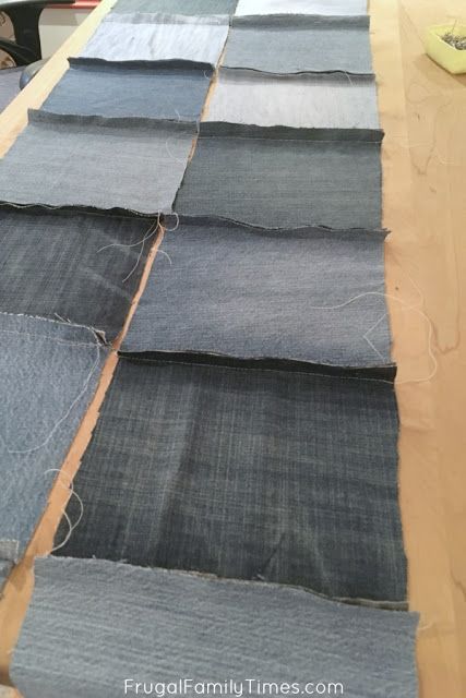 several pieces of denim laid out on a table