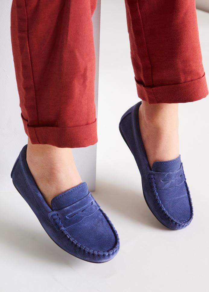 Blue Suede Loafers With Suede Lining, Blue Suede Moccasins With Stitched Sole, Classic Blue Suede Slip-ons, Navy Suede Slip-on Loafers, Blue Suede Moccasins With Rubber Sole, Casual Blue Loafers With Round Toe, Blue Slip-ons With Suede Lining, Casual Navy Suede Loafers, Casual Flat Loafers With Suede Lining