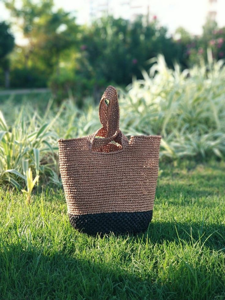 If you're looking for the perfect bag for hot summer days, this handmade raffia beach bag is for you!  Made from natural and recyclable materials, this bag will complete your style on the beach or in the city.  Thanks to its large interior volume, you can comfortably carry your beach towel, sunscreen, books and other beach essentials. You can use it safely with its solid structure, durable seams and sturdy handles.  You can also choose it as a perfect gift for yourself or your loved ones.  Disco Raffia Beach Bag, Recyclable Materials, Beach Essentials, Perfect Bag, Etsy Fashion, Beach Bag, Hot Summer, Summer Days, Beach Towel