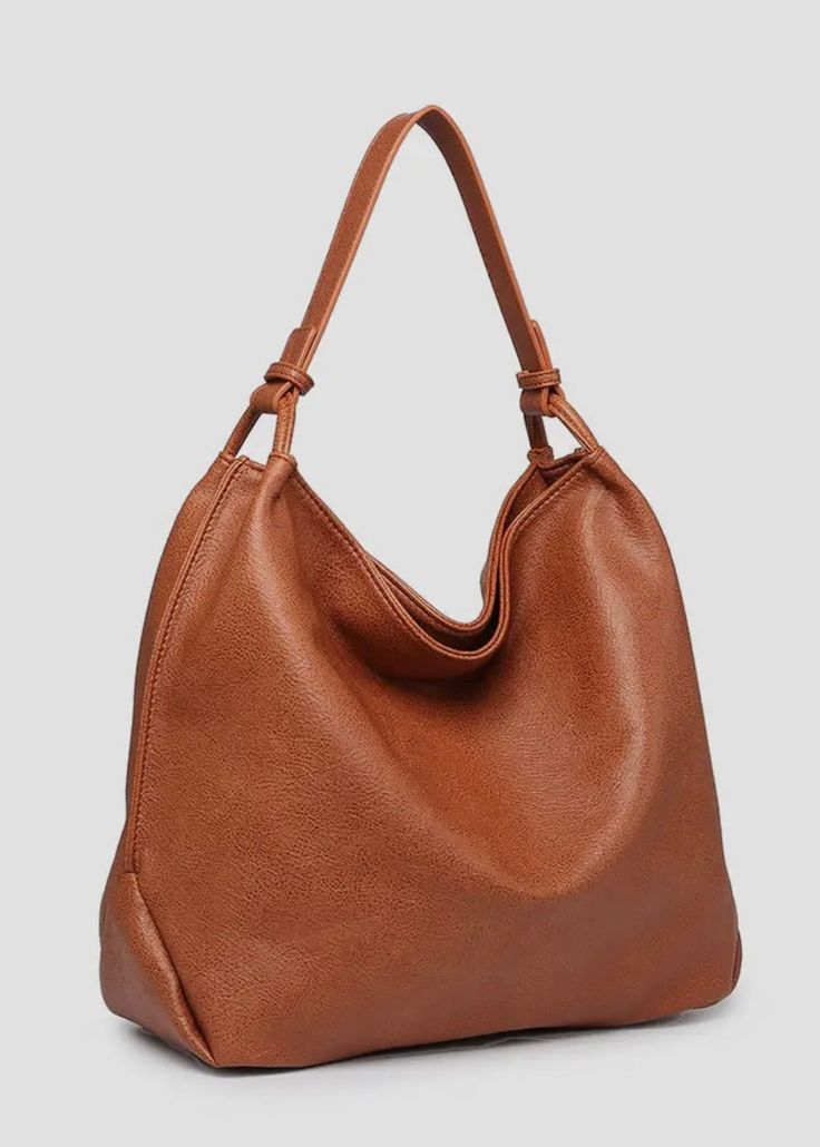 Experience the perfect blend of style and sustainability with our Slouch Bag. Made of vegan leather, this versatile tote features an inner compartment for practical organization. Weighing just 2.5 lbs and measuring 13 x 5.5 x 16 inches, it's the ideal accessory for any occasion. Large Capacity Double Handle Hobo Bag For On-the-go, Solid Color Double Handle Everyday Bag, Solid Color Top Handle Hobo Bag For Everyday, Trendy Softback Bucket Bag For Everyday Use, Solid Color Double Handle Bucket Bag For Everyday Use, Solid Color Double Handle Bucket Bag For On-the-go, Solid Color Double Handle Bags For On-the-go, Faux Leather Hobo Bag With Adjustable Strap For On-the-go, Versatile Hobo Bag For Daily Use With Large Capacity