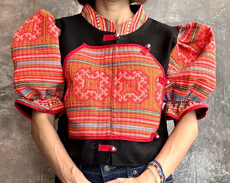 This is so beautiful Embroidered ethnic blouse, crop top. The sleeves are balloon style, super unique crop top. Embroidered by hand 100% Size : Bust 40 inch, Length 19 inch Multicolor Short Sleeve Padded Blouse, Multicolor Padded Blouse With Short Sleeves, Fitted Embroidered Short Sleeve Top, Fitted Embroidered Top With Short Sleeves, Traditional Fitted Cropped Crop Top, Embroidered Fitted Bohemian Crop Top, Fitted Embroidered Bohemian Crop Top, Traditional Fitted Crop Top For Festivals, Fitted Bohemian Embroidered Crop Top