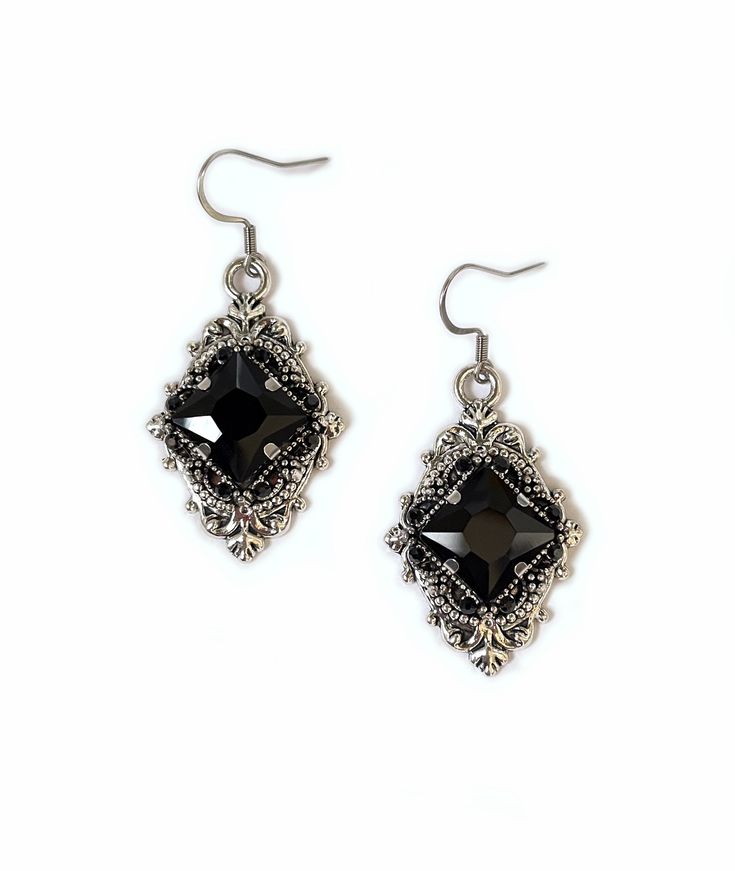 "These richly detailed antiqued silver plated filigree earrings, are adorned with dazzling JET BLACK glass rhinestones that perfectly accentuate a larger jewel in the center of each. Earrings measure 2\" tall, including stainless steel earring hooks, and are 1\" wide. Listing is for earrings ONLY. Matching necklace is available in our store. These are available in a variety of stone colors in our store, along with matching necklaces. If you don't see something available in a stone color you'd li Antique Silver Earrings, 1920's Style, Rainbow Topaz, Earrings Gothic, Choker Pendant, Gothic Accessories, Filigree Earrings, Onyx Earrings, Black Jewelry