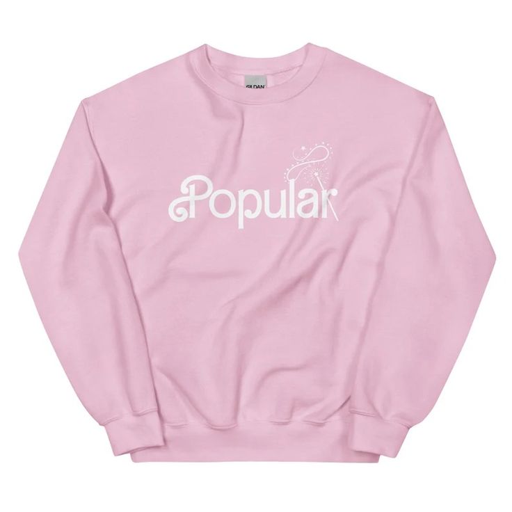 a pink sweatshirt with the word populak written on it in white letters,